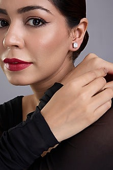 White Finish White Stone Stud Earrings In Sterling Silver