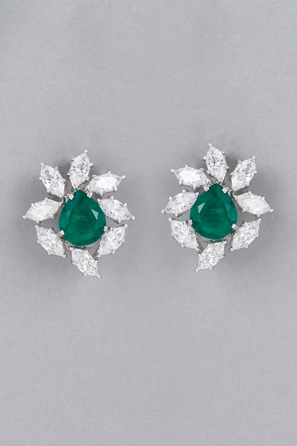 White Finish Green Synthetic Stones & Swarovski Stud Earrings In Sterling Silver