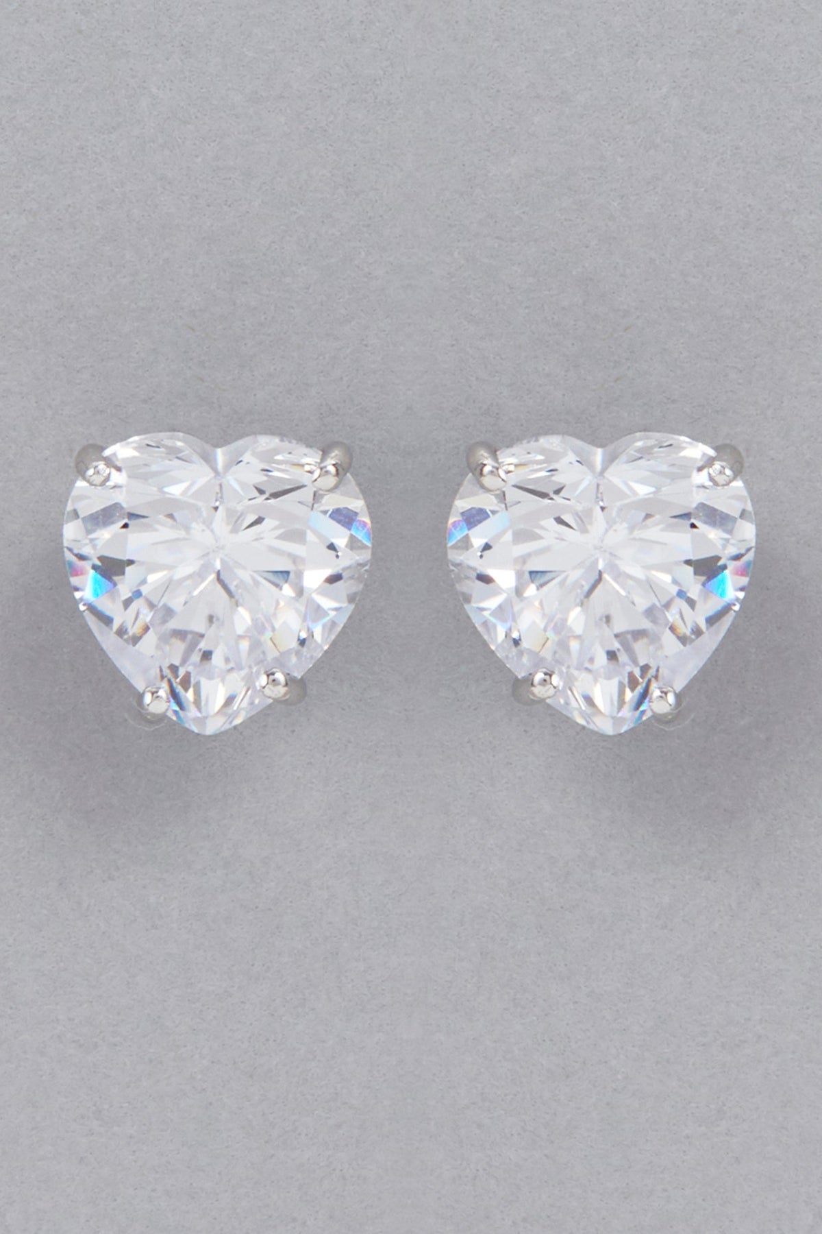 White Finish Swarovski Stud Earrings In Sterling Silver