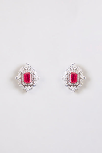 White Finish Zircon & Red Stone Stud Earrings In Sterling Silver