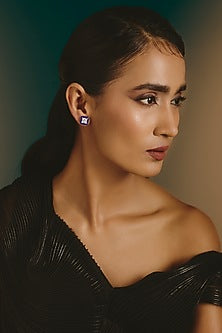 White Finish Blue Stone Stud Earrings In Sterling Silver