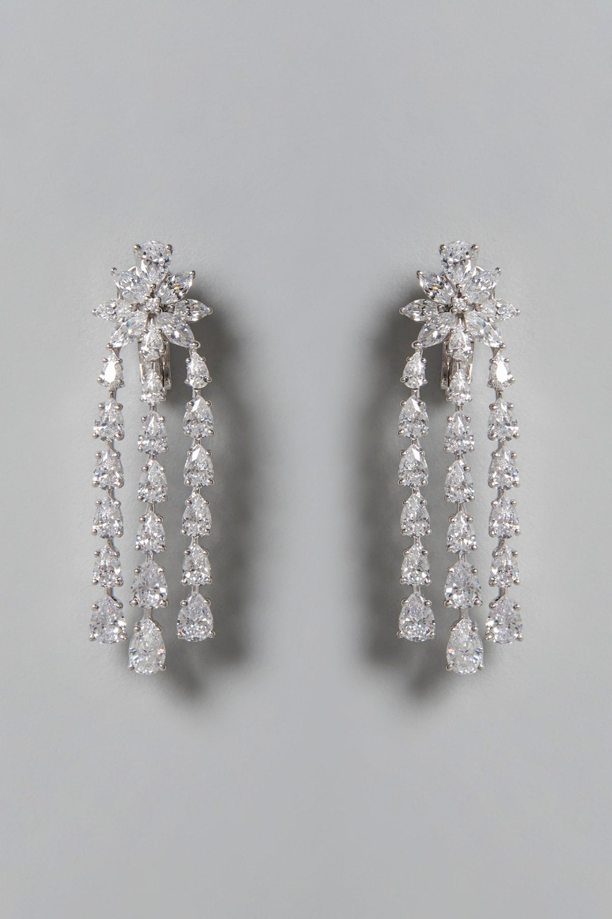 White Finish Swarovski Zirconia Floral Dangler Earrings In Sterling Silver