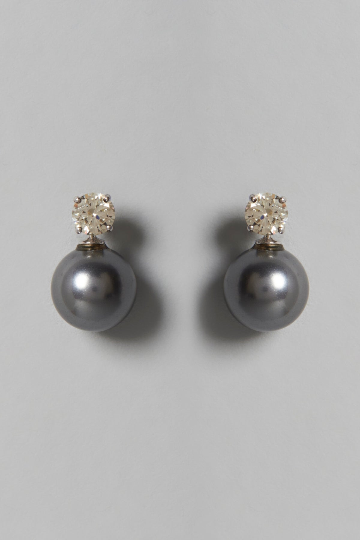 White Finish White Swarovski Zirconia & Black Pearl Dangler Earrings In Sterling Silver