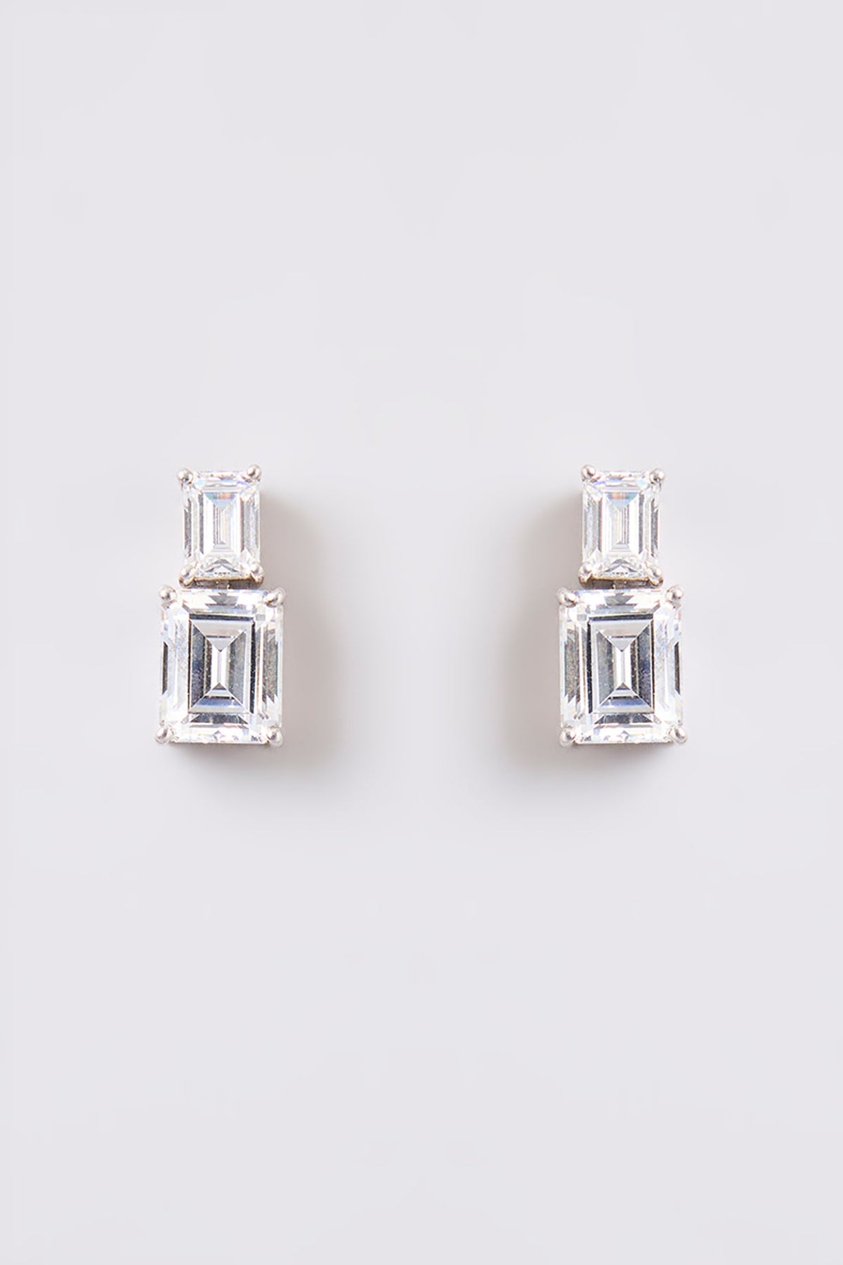 White Finish White Stone Stud Earrings In Sterling Silver