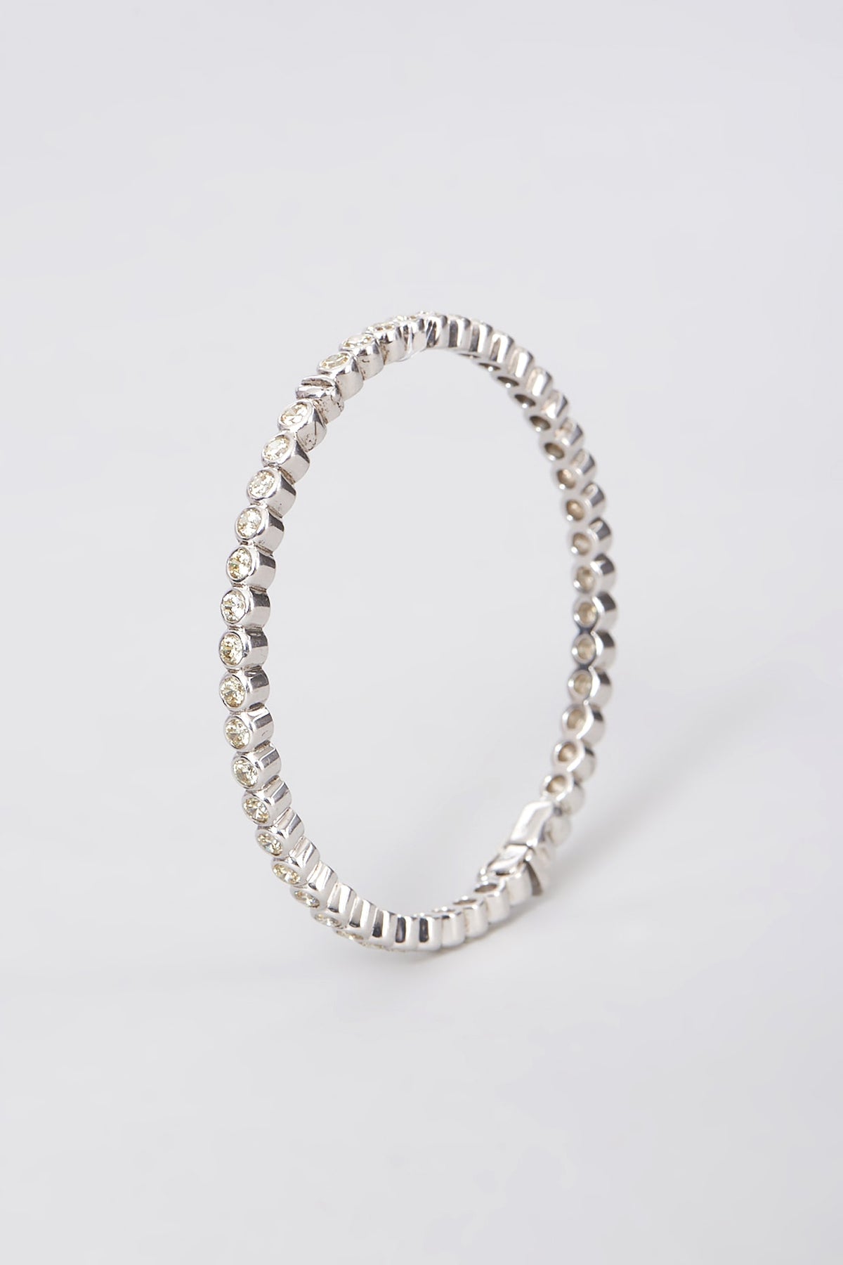 White Rhodium Finish Zircon Bangle In Sterling Silver