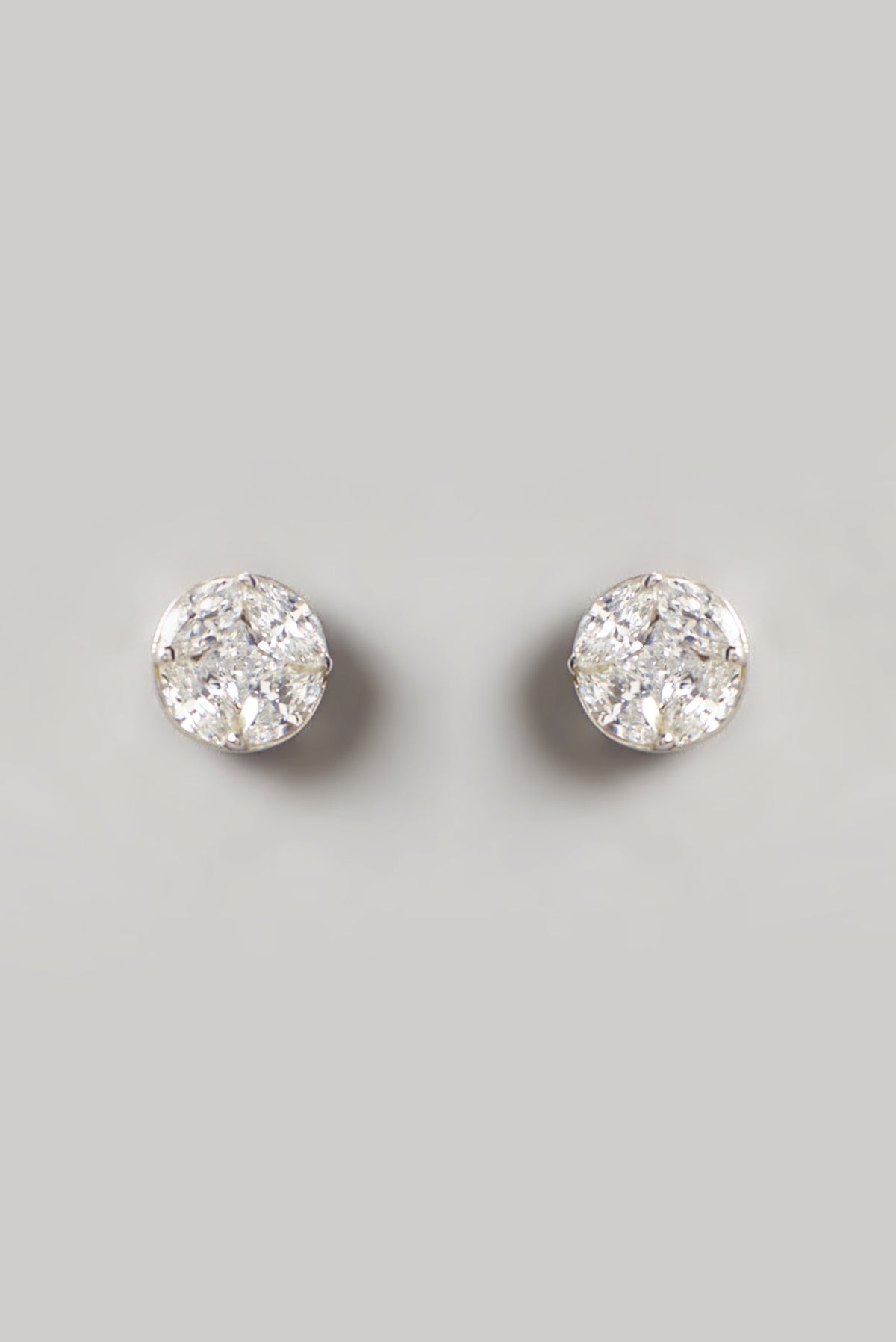 White Finish Swarovski Zirconia Stud Earrings In Sterling Silver