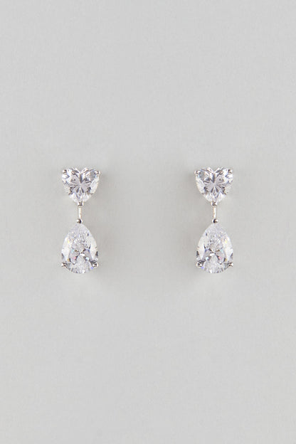 White Finish White Stone Stud Earrings In Sterling Silver