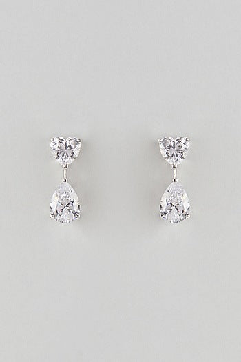 White Finish White Stone Stud Earrings In Sterling Silver
