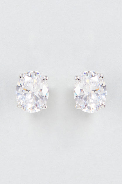 White Finish Oval Cut Swarovski Zirconia Stud Earrings In Sterling Silver