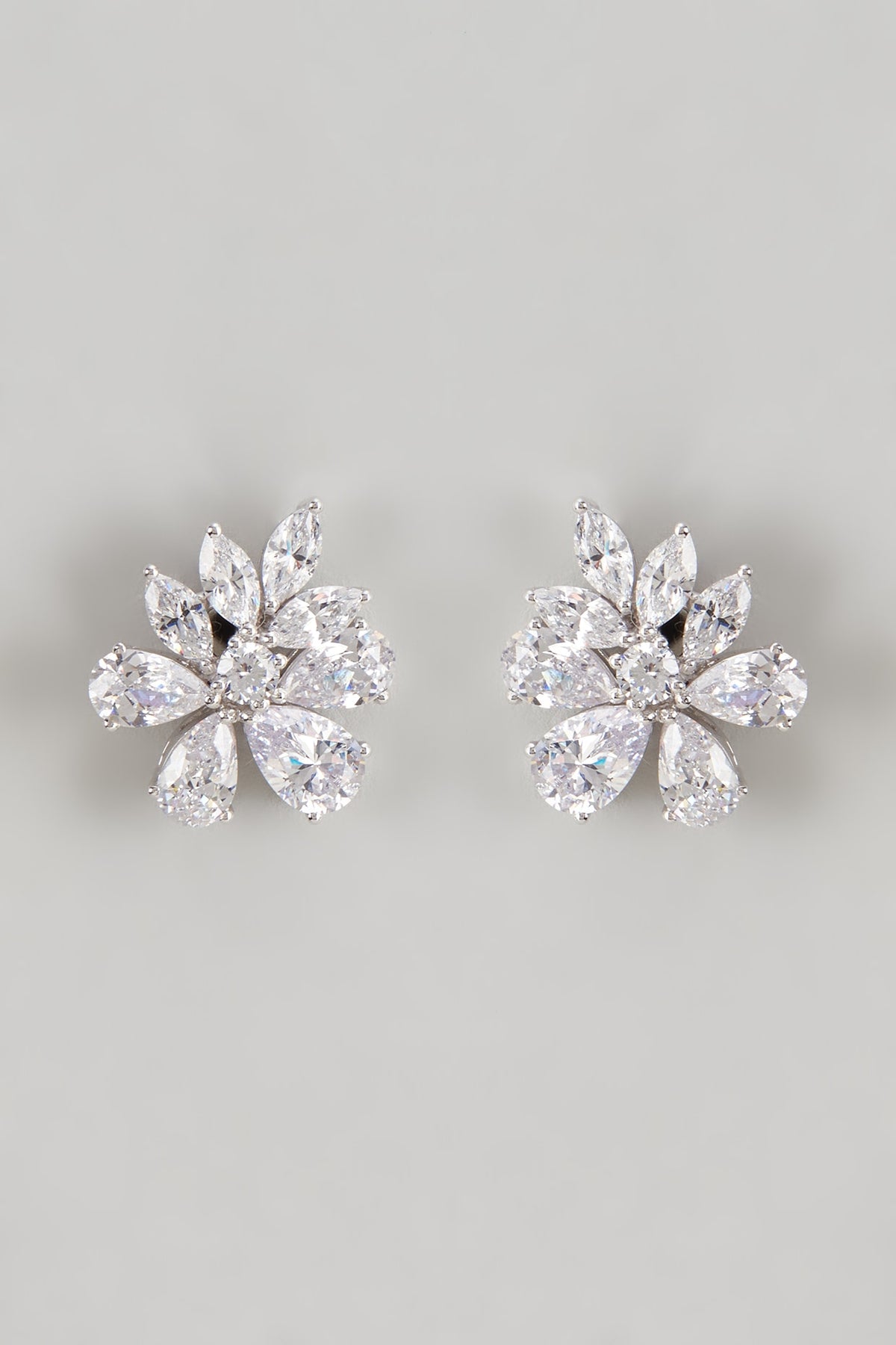 White Finish Swarovski Zirconia Stud Earrings In Sterling Silver