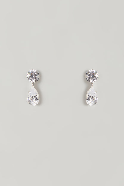 White Finish White Stone Stud Earrings In Sterling Silver
