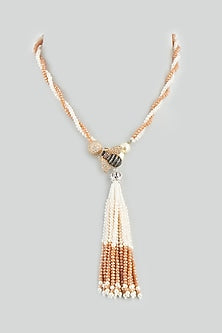 White & Orange Beaded Twisted Bracelet