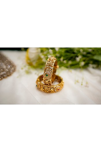 Gold Finish Ruby & Emerald Stone Temple Bangles ( Set Of 2)