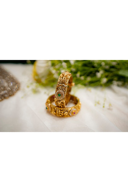 Gold Finish Ruby & Emerald Stone Temple Bangles ( Set Of 2)
