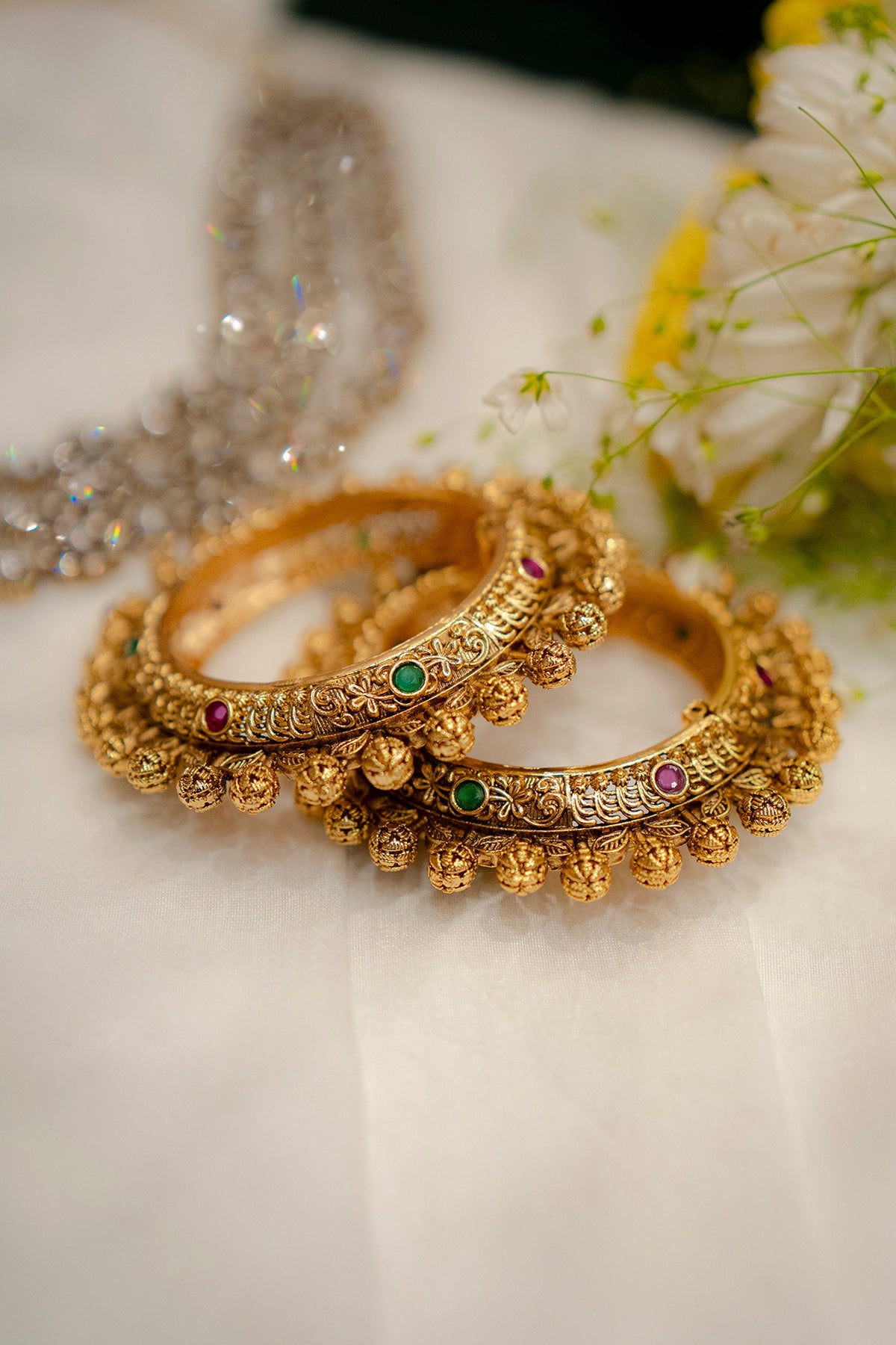 Gold Finish Ruby & Emerald Stone Temple Pacheli Bangles (Set Of 2)