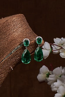 White Finish Zircon Stud Earrings In Sterling Silver