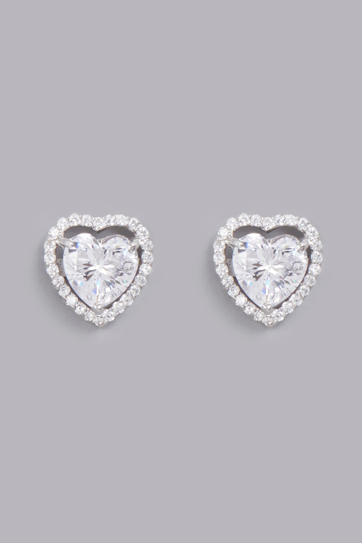 White Finish Heart Stud Earrings In Sterling Silver