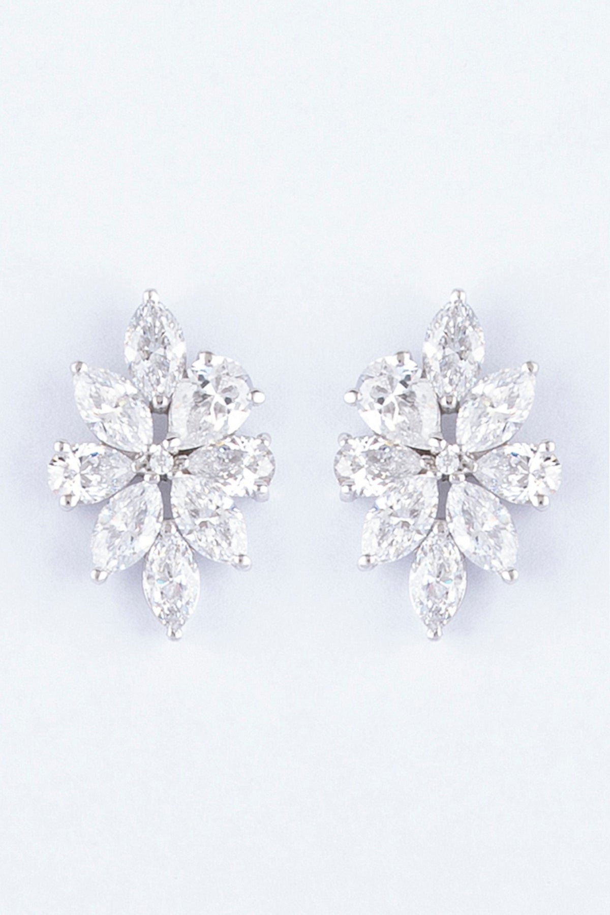 White Finish Zircon Stud Earrings In Sterling Silver