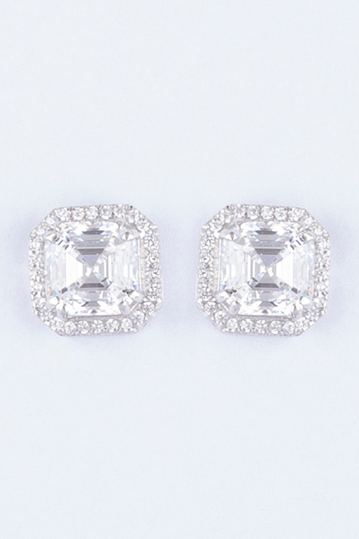 White Finish Stud Earrings With Zircons In Sterling Silver