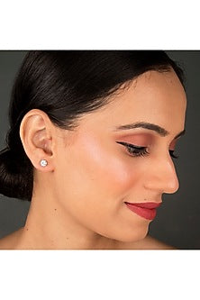 White Finish Zircons Stud Earrings In Sterling Silver