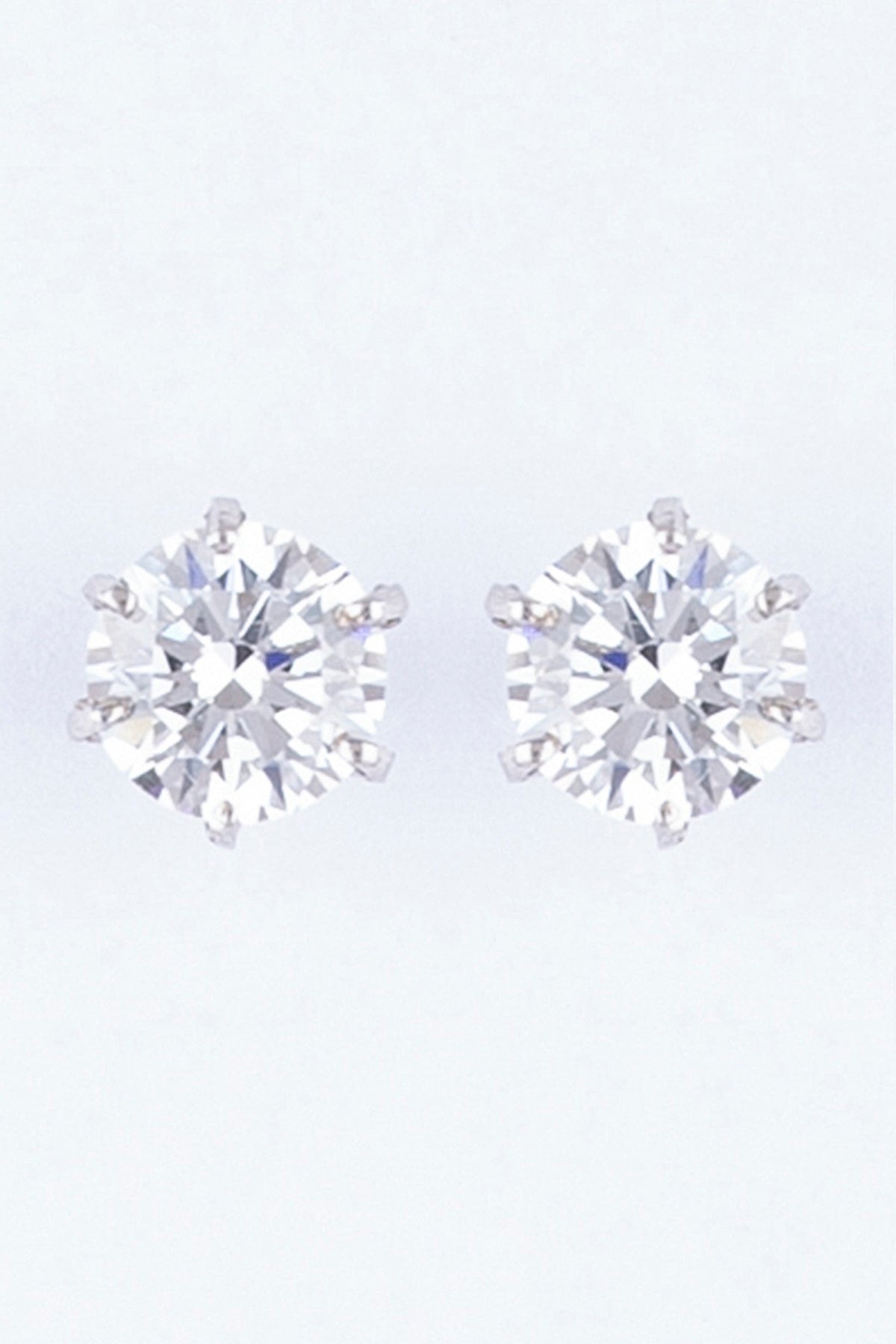 White Finish Sterling Silver Stud Earrings With Zircons
