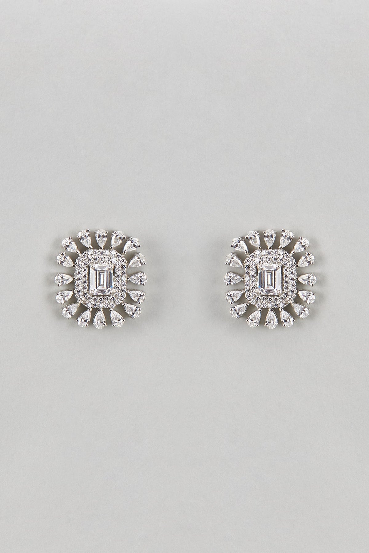 White Finish Zircon & Green Stone Stud Earrings In Sterling Silver