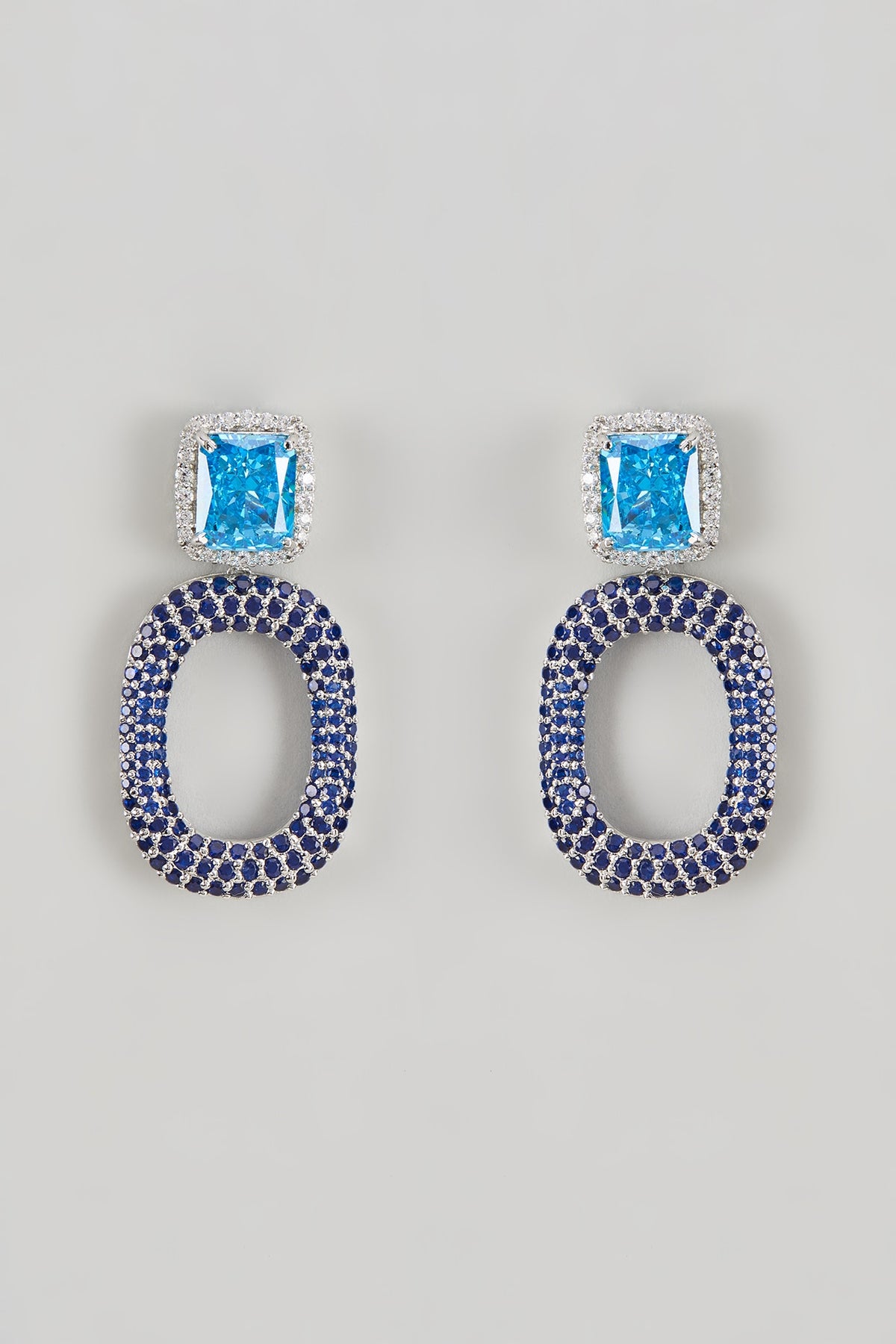 White Finish CZ Diamond & Aqua Stone Dangler Earrings In Sterling Silver