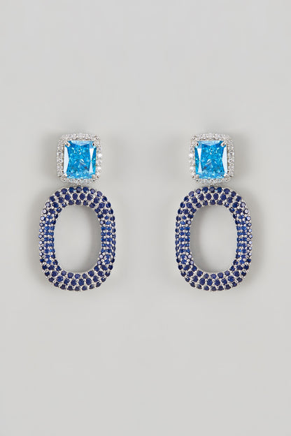 White Finish CZ Diamond & Aqua Stone Dangler Earrings In Sterling Silver