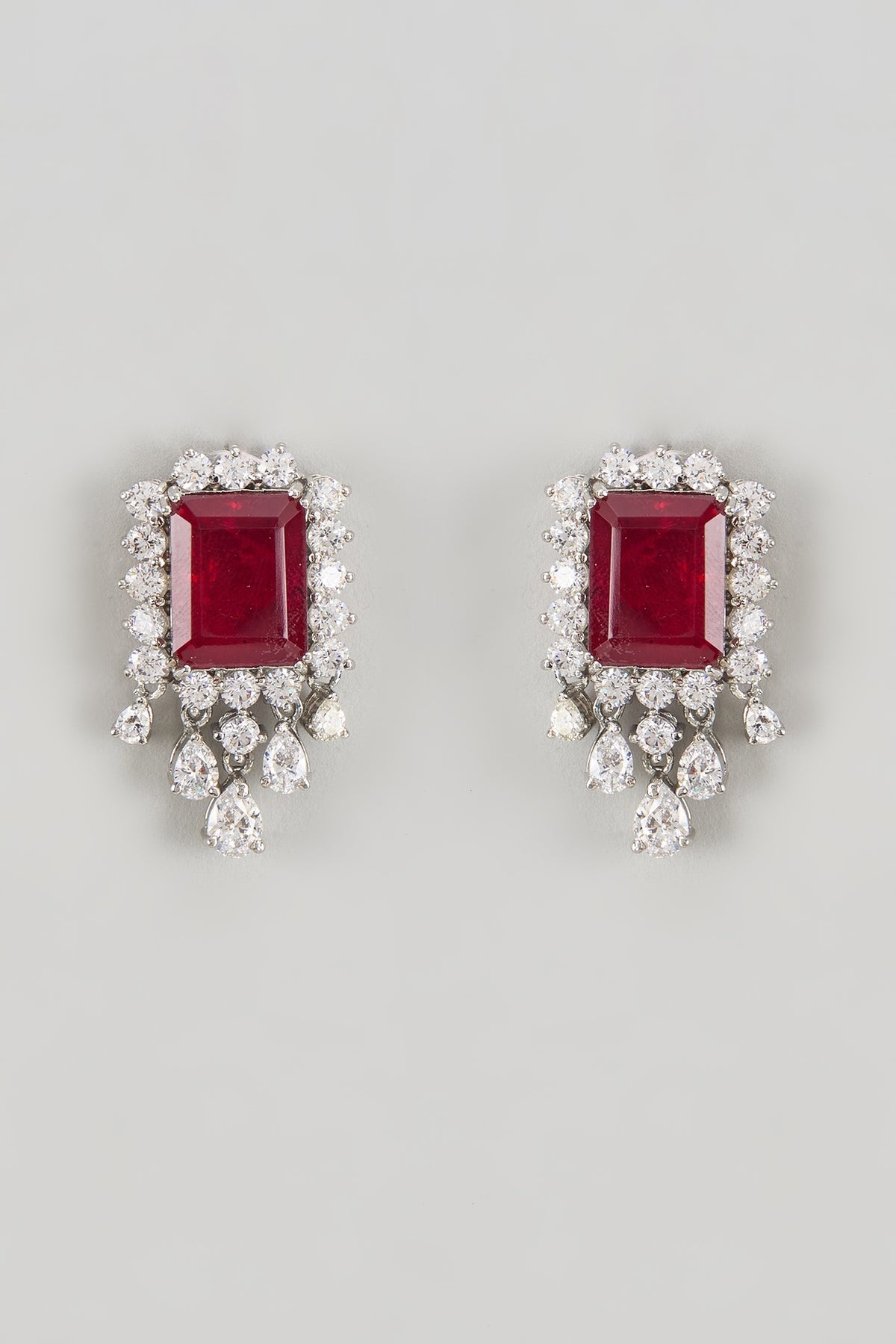 White Finish CZ Diamond & Ruby Stone Stud Earrings In Sterling Silver