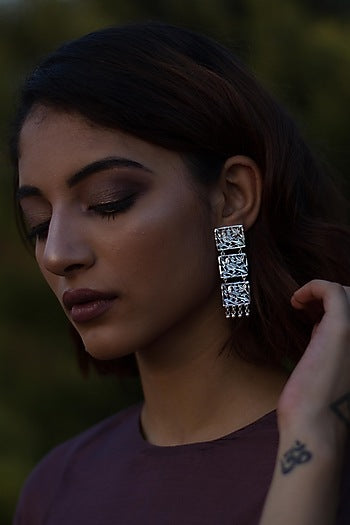 White Finish Cutwork Dangler Earrings In Sterling Silver