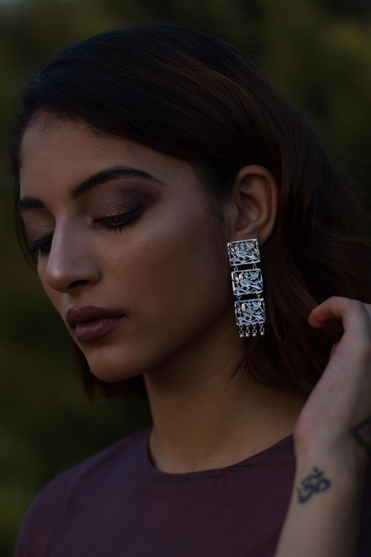 White Finish Cutwork Dangler Earrings In Sterling Silver