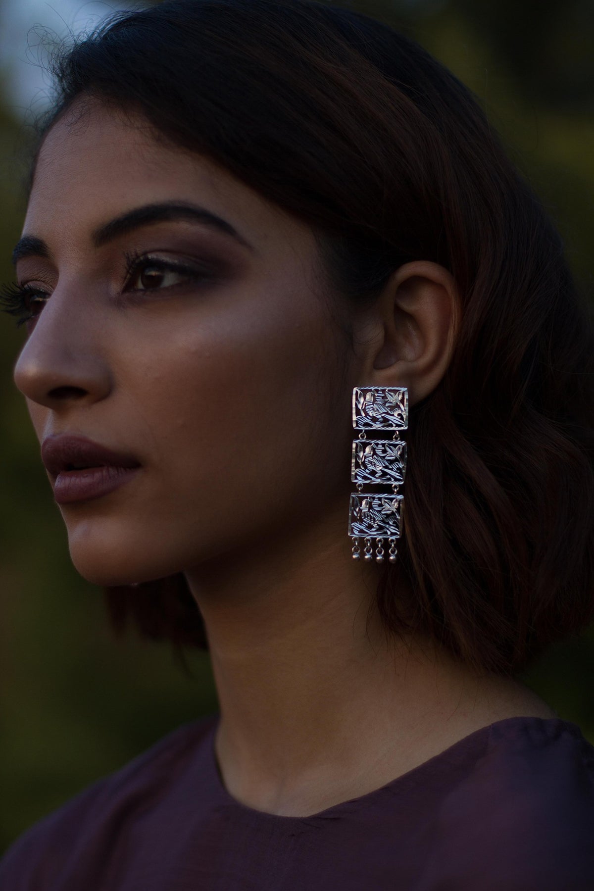 White Finish Cutwork Dangler Earrings In Sterling Silver