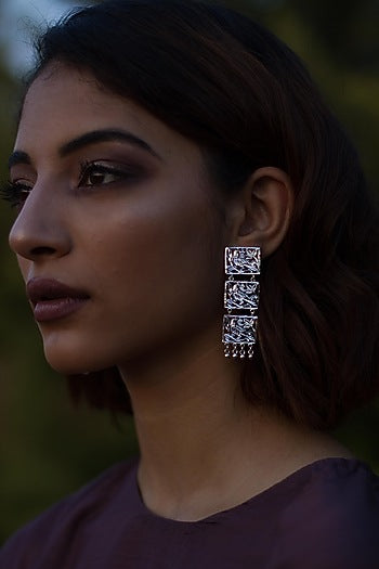 White Finish Cutwork Dangler Earrings In Sterling Silver