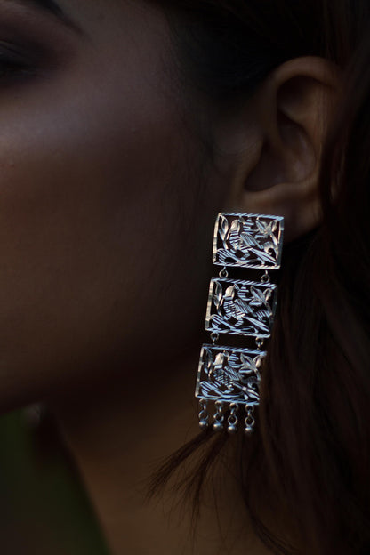 White Finish Cutwork Dangler Earrings In Sterling Silver