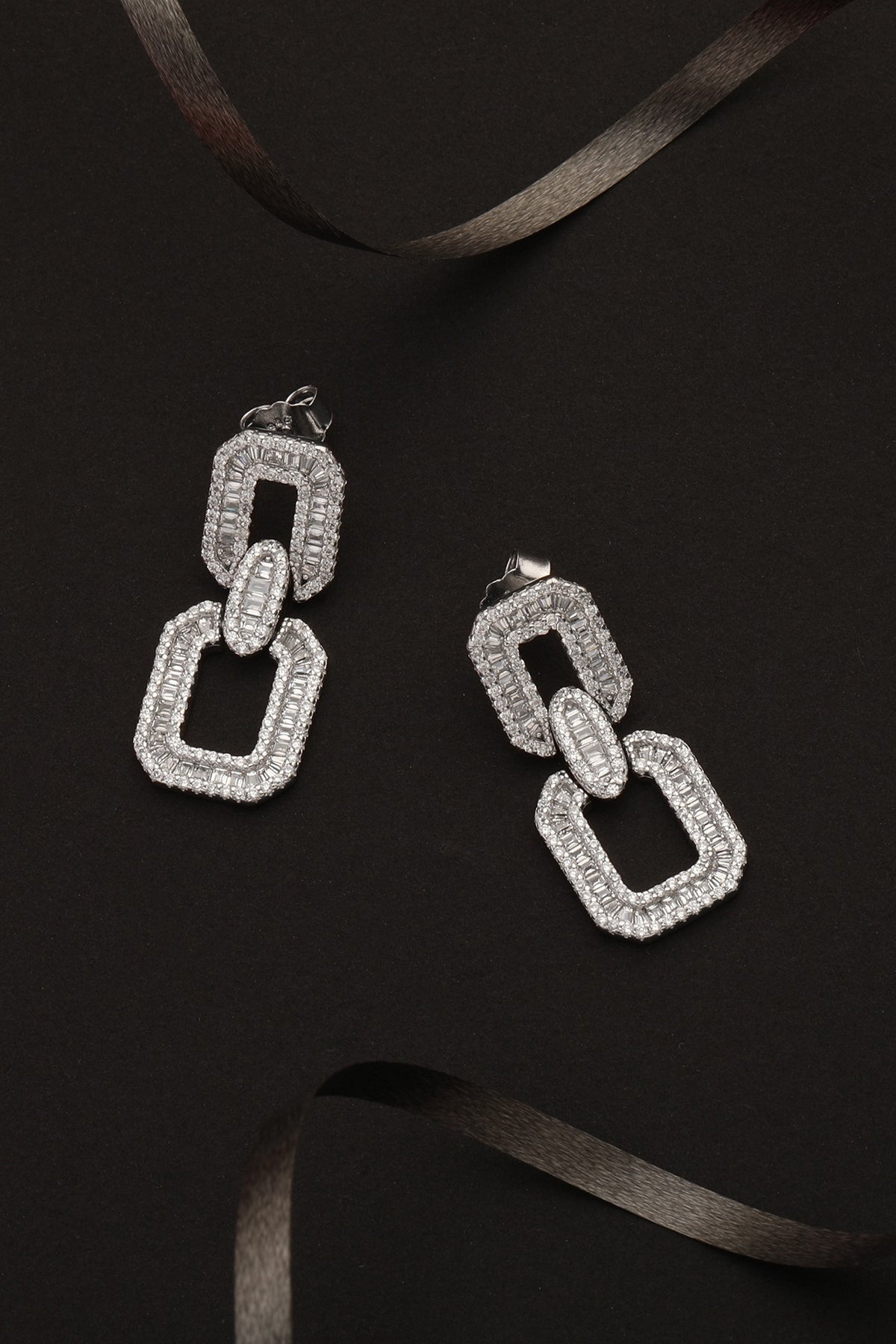 White Finish Cubic Zirconia Dangler Earrings In Sterling Silver