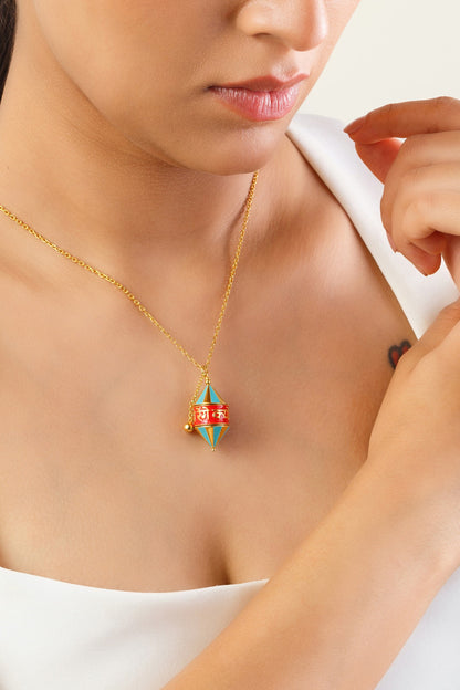 Gold Plated Blue Synthetic Stone Rotating Prayer Wheel Necklace