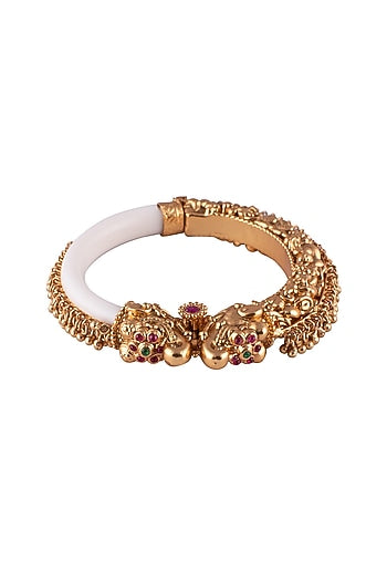 Gold Finish Bangle With A Red Stone