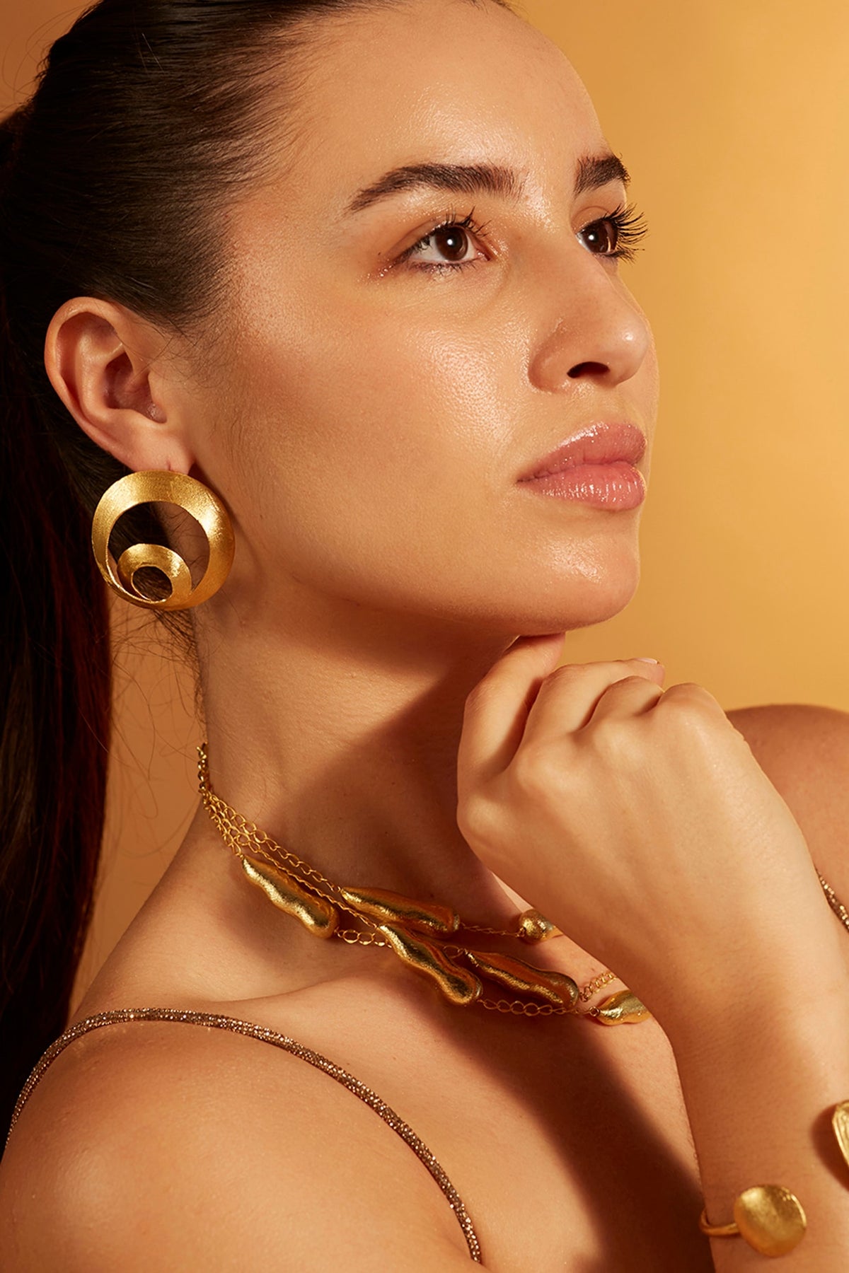 Gold Finish Infinity Loop Stud Earrings