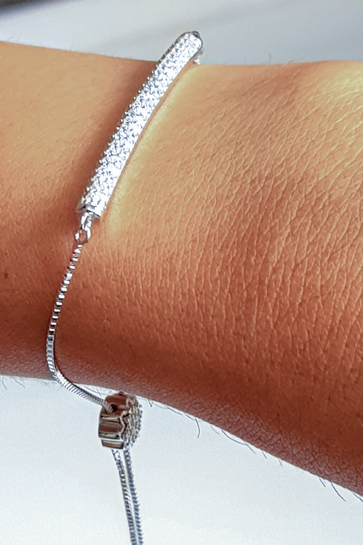 White Finish Cubic Zirconia Adjustable Bracelet