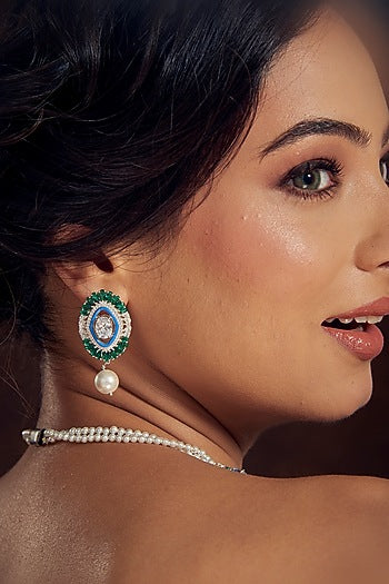 White Finish Zircon Enameled Stud Earrings In Sterling Silver