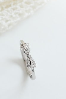 White Finish Zircon Knot Ring In Sterling Silver