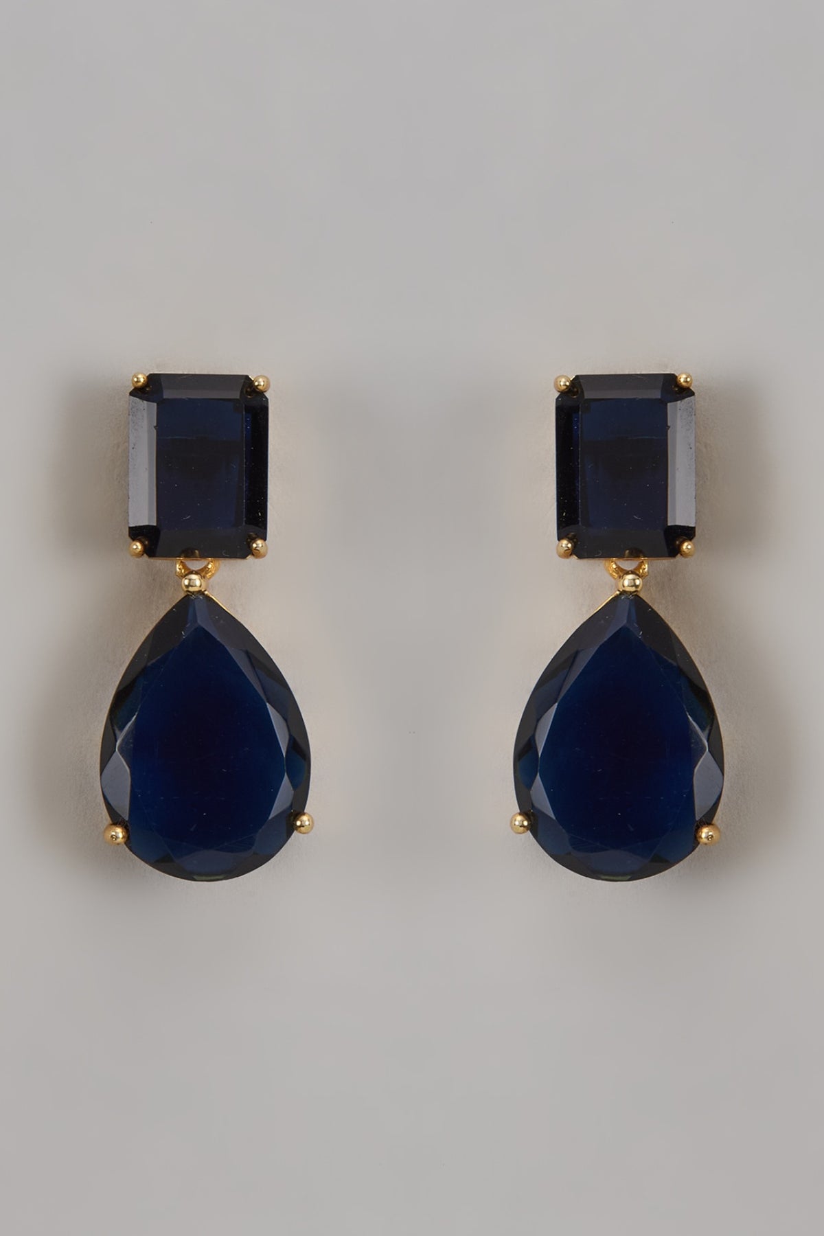 Gold Finish Synthetic Blue Stone Dangler Earrings