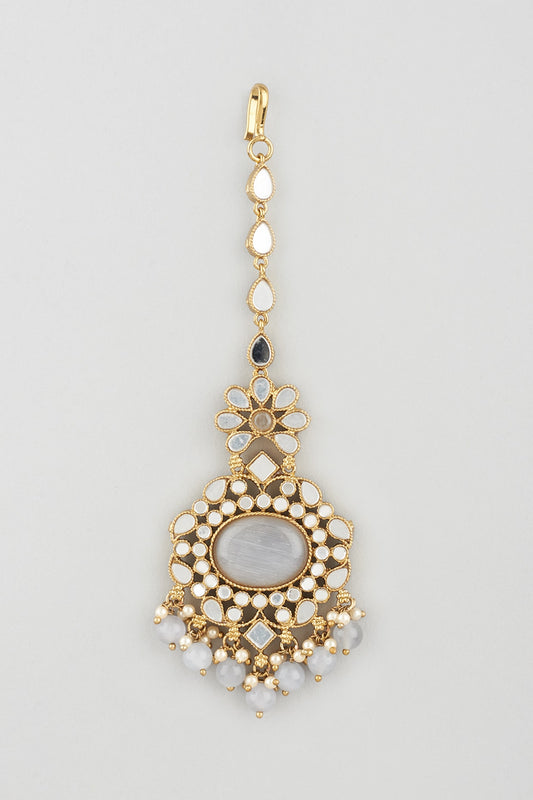 Gold Finish White Enamelled Jhumka Earrings With Mangtikka