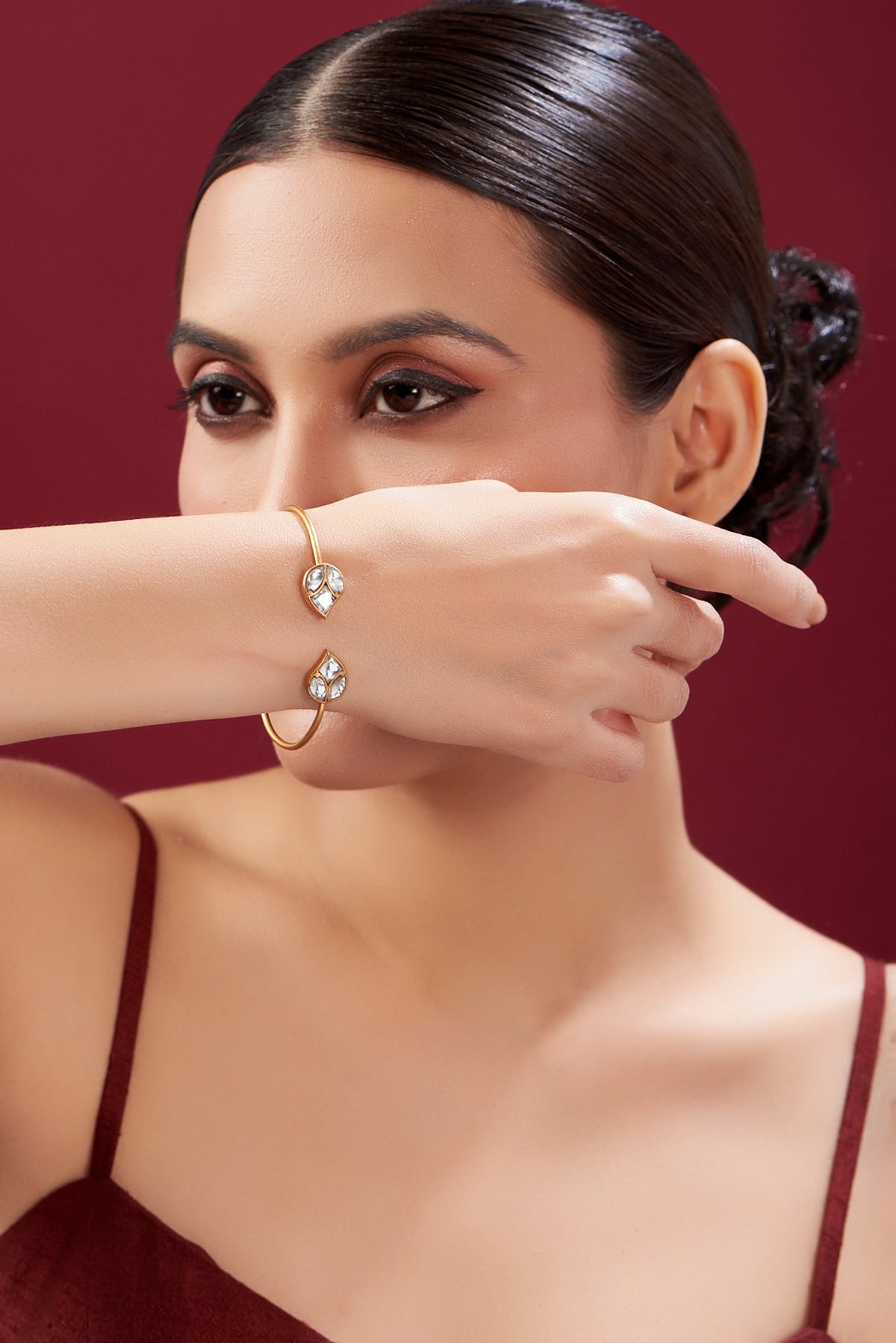 Gold Plated Kundan Polki Leaf Motif Twisted Bracelet