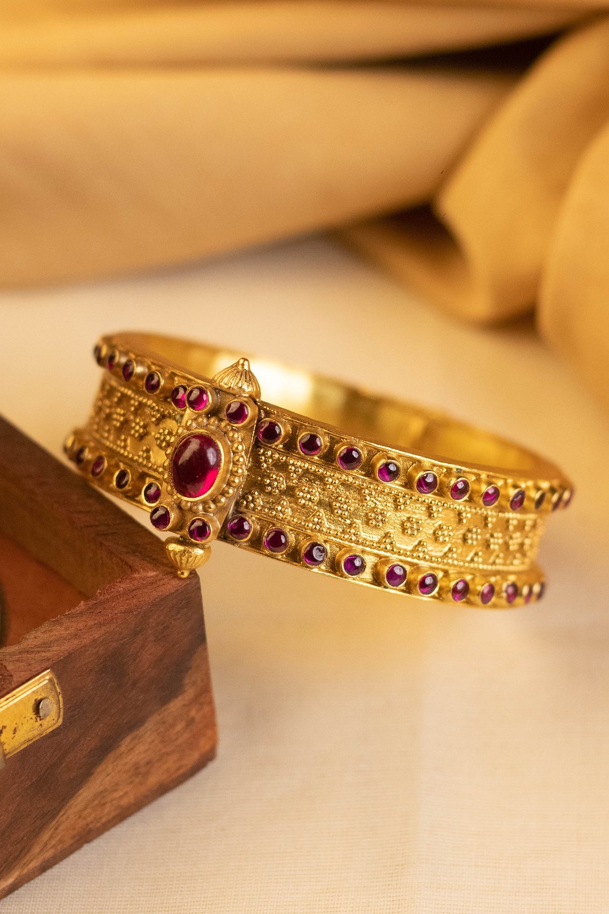 Gold Finish Onyx Temple Bangle In Sterling Silver