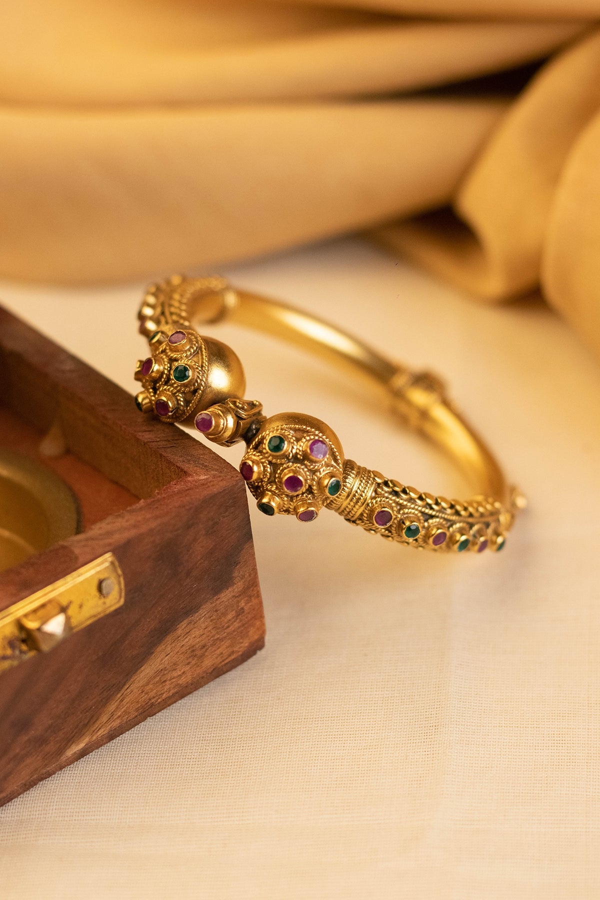 Gold Finish Onyx Temple Bangle In Sterling Silver