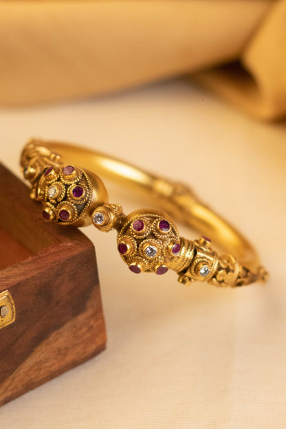 Gold Finish Onyx Temple Bangle In Sterling Silver