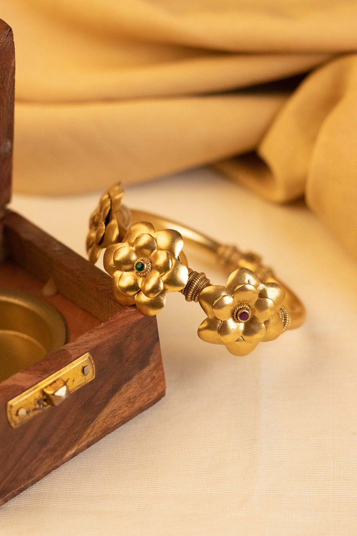 Gold Finish Temple Bangle In Sterling Silver