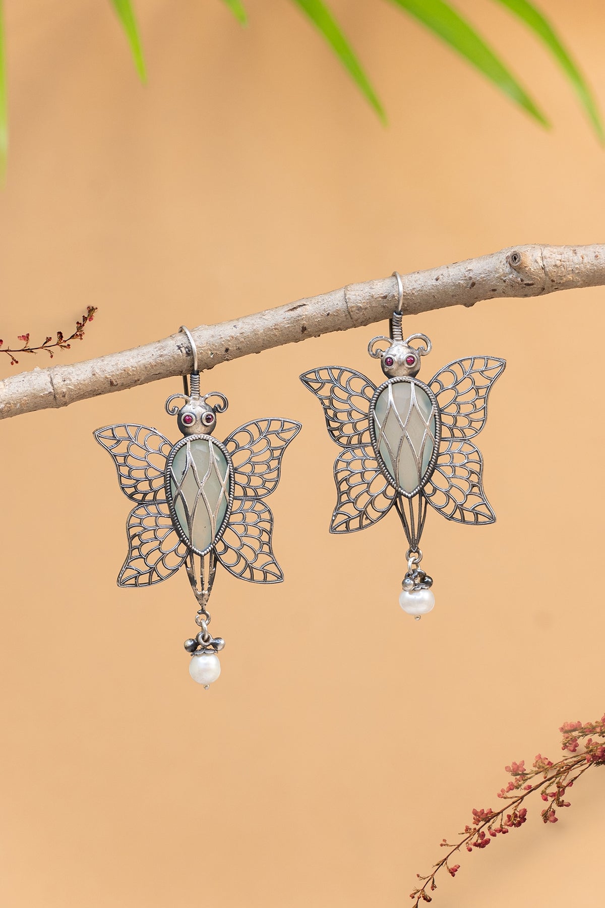 White Finish Pearl Butterfly Dangler Earrings In Sterling Silver