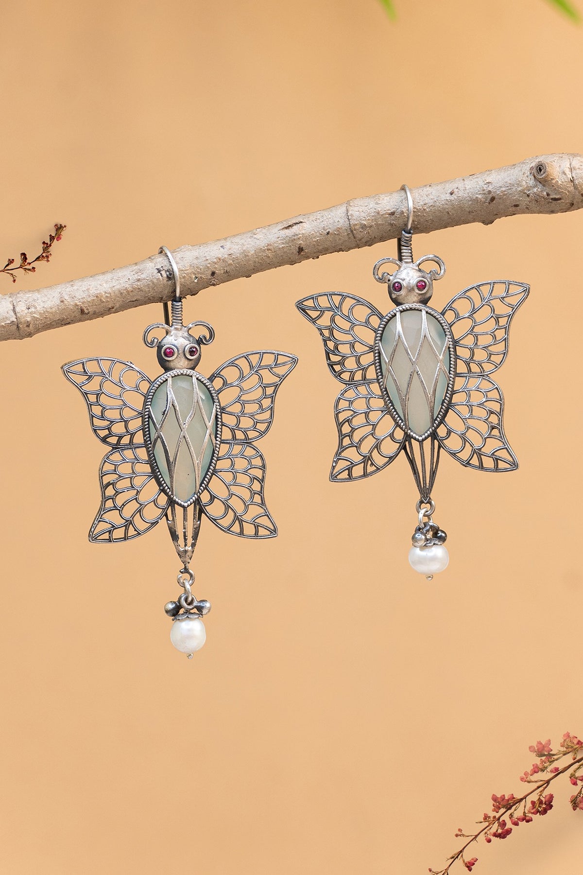 White Finish Pearl Butterfly Dangler Earrings In Sterling Silver